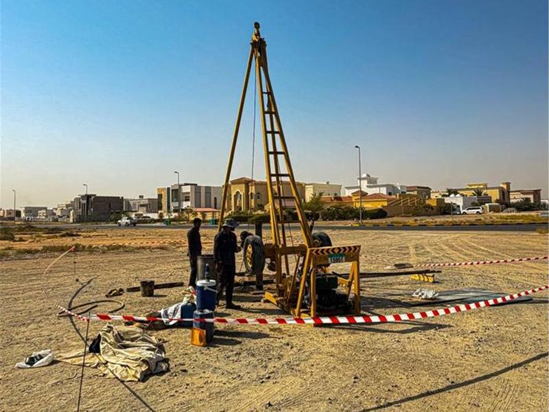Standard Penetration Test tripod rig with boundary tape