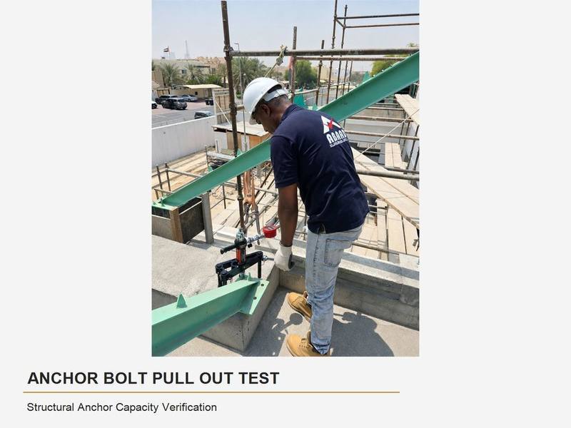 Abaad technician performing an anchor bolt pull-out test on a structural steel connection