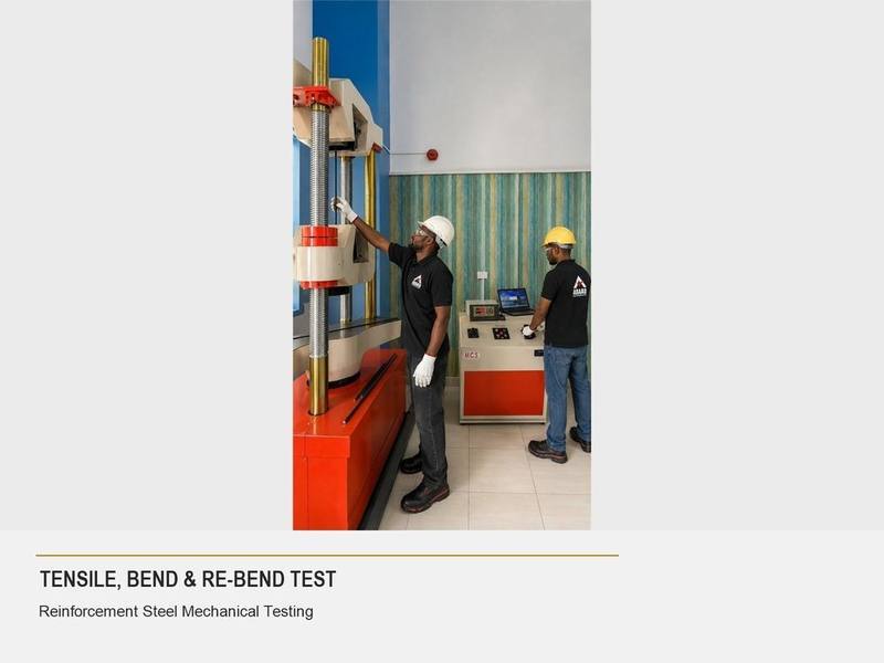 Abaad technicians performing a tensile, bend and re-bend test on reinforcement steel