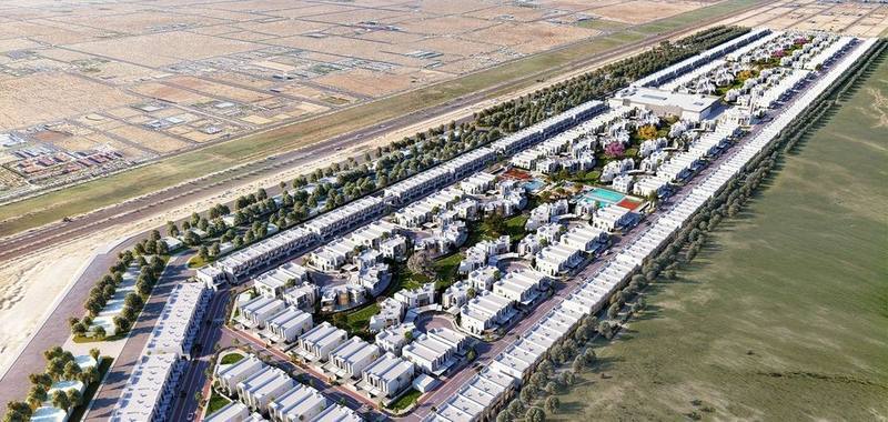 Al Tayy villa community masterplan with pool and recreation area, aerial view